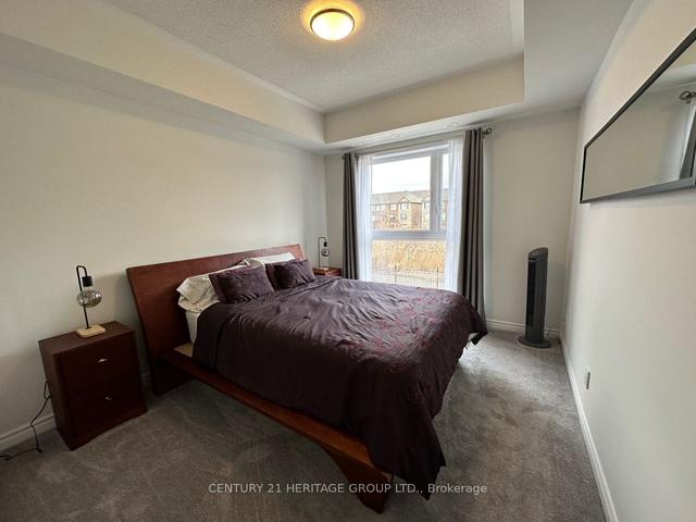 203 - 349 Wheat Boom Dr, Townhouse with 2 bedrooms, 1 bathrooms and 1 parking in Oakville ON | Image 11