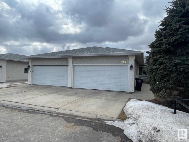 6584 158 Av Nw, House attached with 3 bedrooms, 2 bathrooms and null parking in Edmonton AB | Image 25