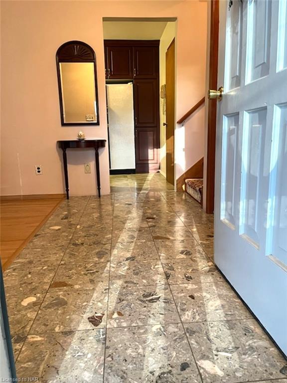 Please come in to your foyer with marble flooring | Image 33