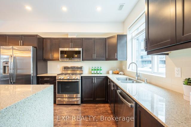 24 - 4 Concord Pl N, Townhouse with 3 bedrooms, 3 bathrooms and 2 parking in Grimsby ON | Image 3