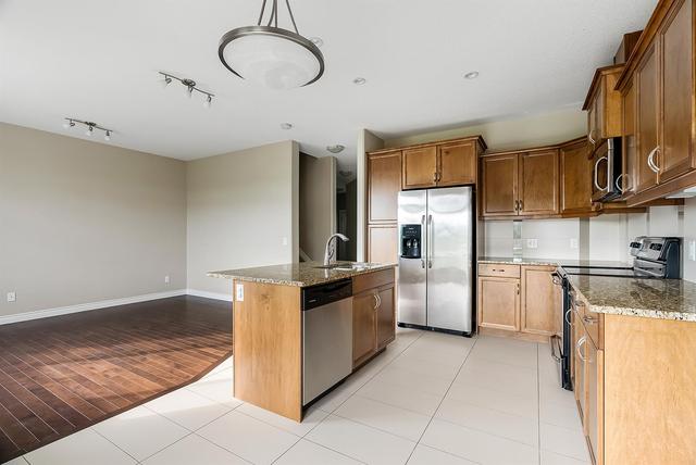 2 - 441 Millennium Drive, Home with 3 bedrooms, 3 bathrooms and 4 parking in Wood Buffalo AB | Image 4