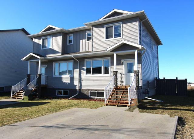 12654 103b Street, Home with 3 bedrooms, 2 bathrooms and 2 parking in Grande Prairie AB | Image 2