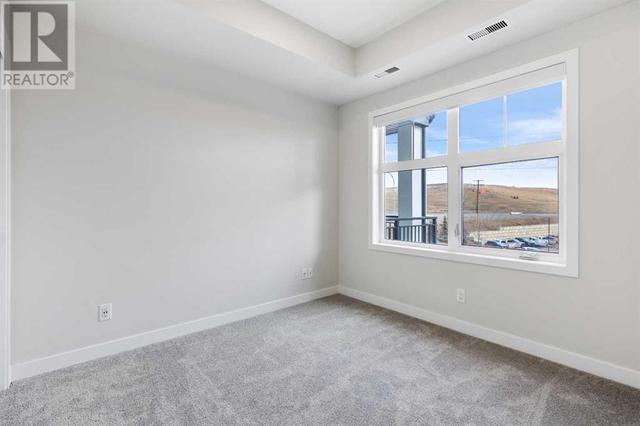 319, - 255 Les Jardins Park Se, Condo with 2 bedrooms, 1 bathrooms and 1 parking in Calgary AB | Image 14