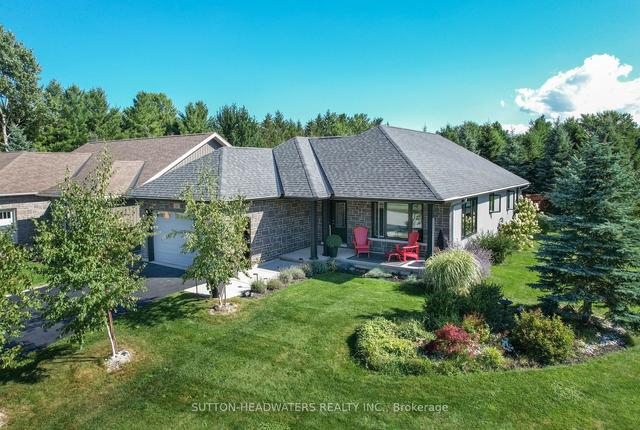 61 Iron Wood Dr E, House detached with 2 bedrooms, 3 bathrooms and 3 parking in Meaford ON | Image 1