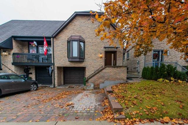 28 Lafferty St, House semidetached with 4 bedrooms, 2 bathrooms and 3 parking in Toronto ON | Image 1