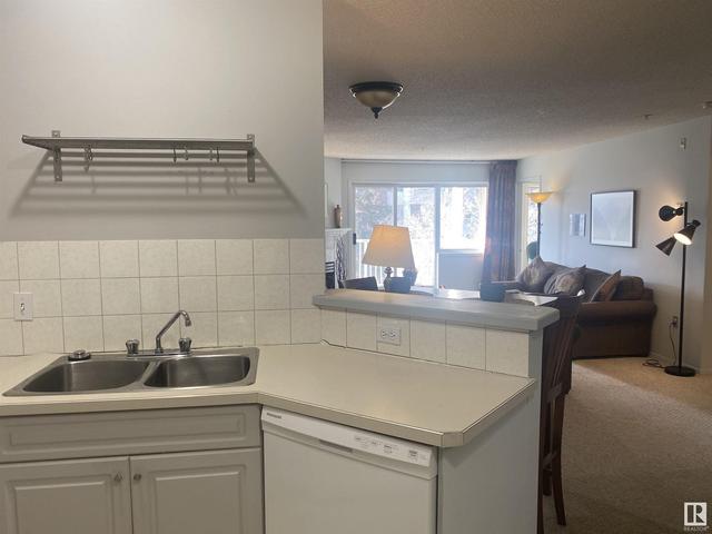 404 - 11716 100 Av Nw, Condo with 2 bedrooms, 2 bathrooms and null parking in Edmonton AB | Card Image