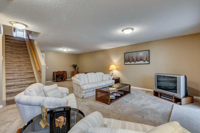 133 Sienna Park Green Sw, Home with 3 bedrooms, 2 bathrooms and 4 parking in Calgary AB | Image 23