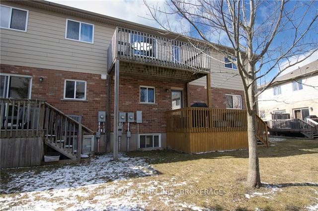 58 - 3320 Meadowgate Boulevard, House attached with 2 bedrooms, 1 bathrooms and 2 parking in London ON | Image 1