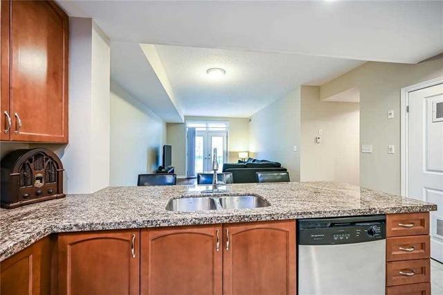 102 - 396 Plains Rd E, Condo with 2 bedrooms, 2 bathrooms and 1 parking in Burlington ON | Image 2