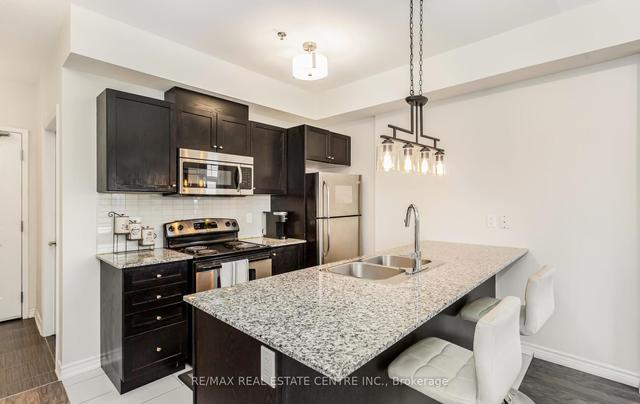 301 - 1360 Costigan Rd, Condo with 2 bedrooms, 2 bathrooms and 1 parking in Milton ON | Image 10