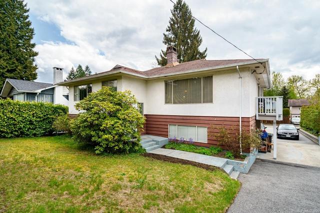 1206 Como Lake Avenue, House detached with 4 bedrooms, 2 bathrooms and null parking in Coquitlam BC | Card Image