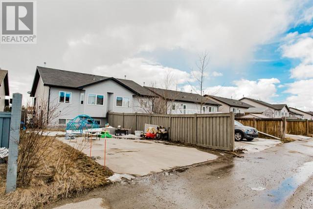 9009 Lakeland Drive, House semidetached with 4 bedrooms, 2 bathrooms and 2 parking in Grande Prairie AB | Image 27