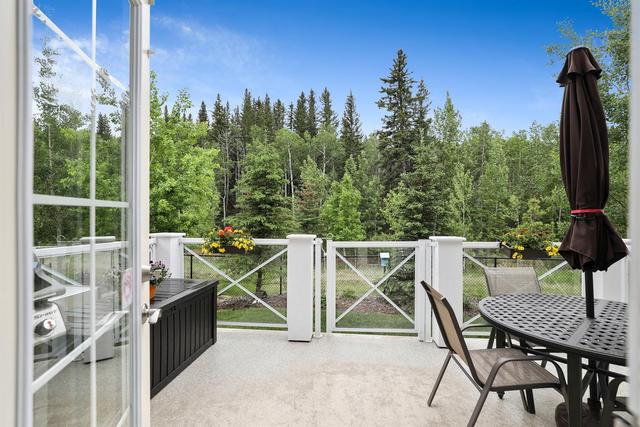 33 Riviera Way, Home with 3 bedrooms, 2 bathrooms and 2 parking in Cochrane AB | Image 1