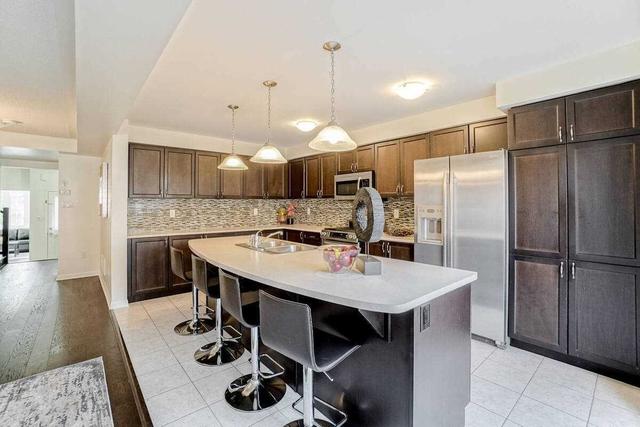 1011 Timmer Pl, House attached with 4 bedrooms, 3 bathrooms and 2 parking in Milton ON | Image 6
