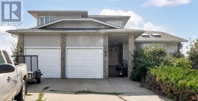 915 7 Street Se, House detached with 4 bedrooms, 3 bathrooms and 2 parking in Redcliff AB | Image 2