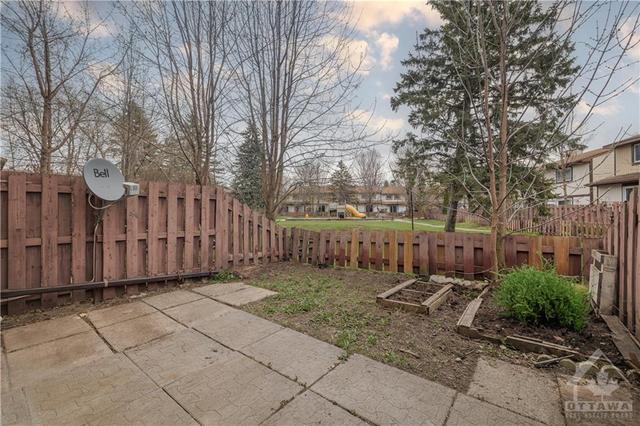 The sizeable, fenced backyard can be a gardeners delight  and easily be set up for outdoor entertaining . This space offers extra privacy with no rear neighbours. | Image 30
