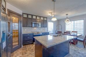 122 Channelside Cove Sw, House detached with 7 bedrooms, 3 bathrooms and 4 parking in Calgary AB | Image 10