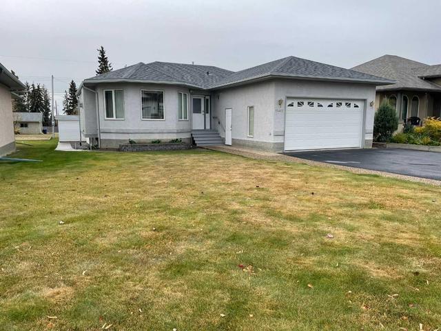 11417 106 Avenue N, House detached with 3 bedrooms, 3 bathrooms and 4 parking in Fairview AB | Image 1