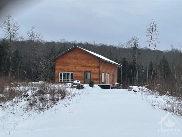 1786 Kashawakawak Lake Trail, House detached with 1 bedrooms, 1 bathrooms and 10 parking in North Frontenac ON | Image 2