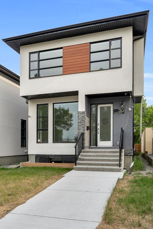 313 Hendon Drive Nw, House detached with 4 bedrooms, 3 bathrooms and 2 parking in Calgary AB | Image 2