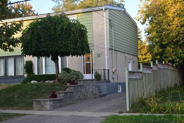 12 Chevron Cres, House semidetached with 3 bedrooms, 2 bathrooms and 2 parking in Toronto ON | Image 1