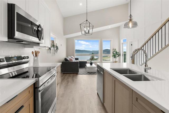 1806 Grey Owl Court, House detached with 4 bedrooms, 3 bathrooms and 3 parking in Kelowna BC | Image 11