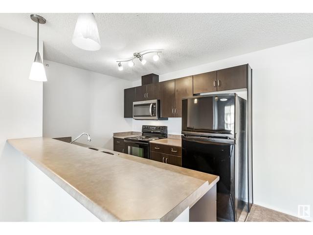 412 - 1188 Hyndman Rd Nw, Condo with 2 bedrooms, 2 bathrooms and null parking in Edmonton AB | Image 11