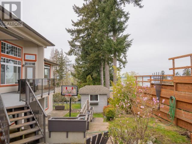 6929 Retaskit Crt, House detached with 5 bedrooms, 4 bathrooms and 2 parking in Powell River BC | Image 54