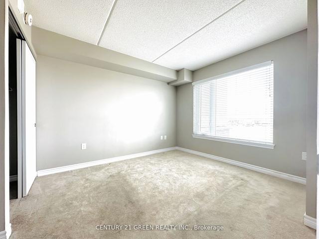 402 - 716 Main St E, Condo with 2 bedrooms, 2 bathrooms and 1 parking in Milton ON | Image 2