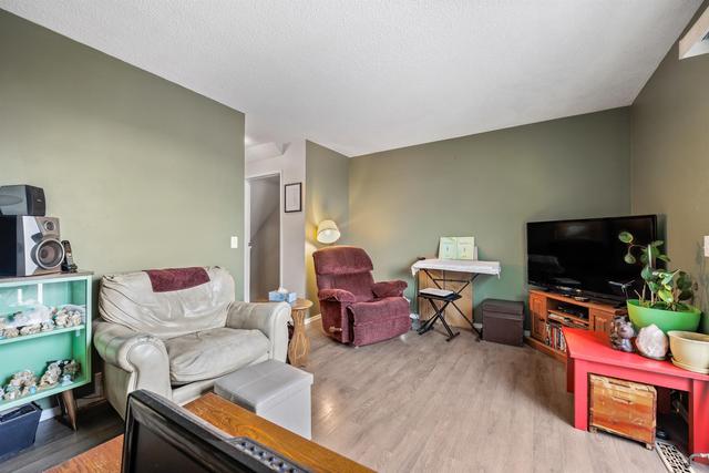 48 - 14736 Deerfield Drive Se, Home with 3 bedrooms, 1 bathrooms and 2 parking in Calgary AB | Image 2