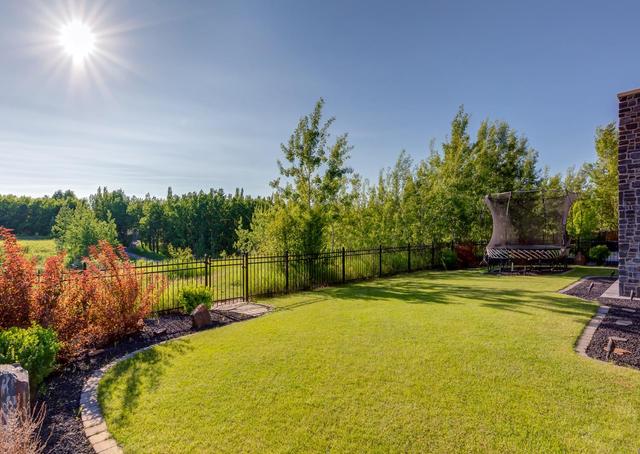 27 Aspen Ridge Court Sw, House detached with 4 bedrooms, 4 bathrooms and 6 parking in Calgary AB | Image 6