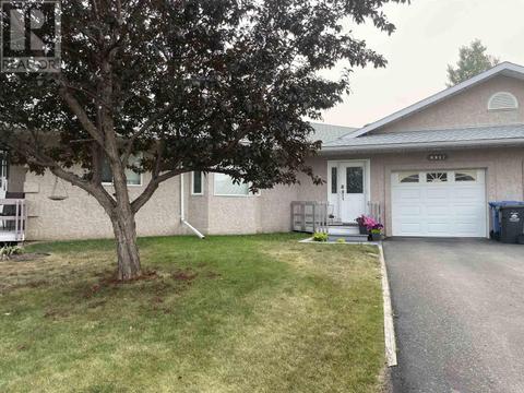 9917 115 Avenue, Home with 2 bedrooms, 2 bathrooms and null parking in Fort St. John BC | Card Image
