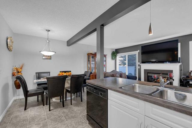 88 Eversyde Court Sw, Home with 3 bedrooms, 1 bathrooms and 3 parking in Calgary AB | Image 13