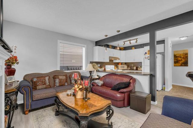 88 Eversyde Court Sw, Home with 3 bedrooms, 1 bathrooms and 3 parking in Calgary AB | Image 9