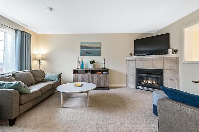 12 Crystal Shores Cove, Home with 2 bedrooms, 2 bathrooms and 2 parking in Calgary AB | Image 7