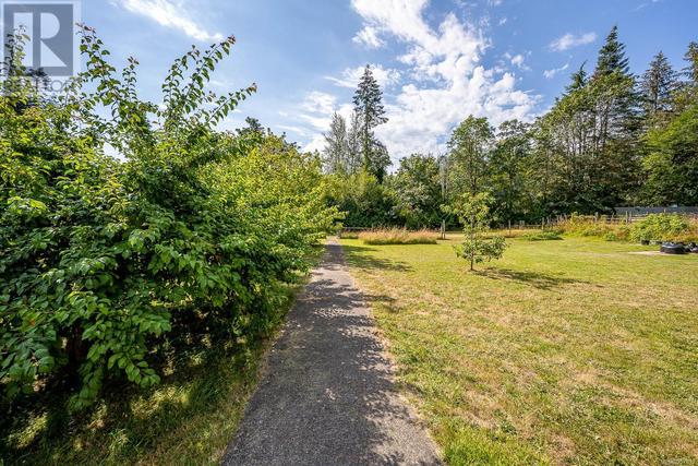 8185 Island Hwy S, House detached with 4 bedrooms, 4 bathrooms and 6 parking in Comox Valley A BC | Image 64