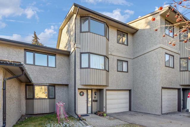 56 - 23 Glamis Drive Sw, Home with 3 bedrooms, 2 bathrooms and 2 parking in Calgary AB | Image 1