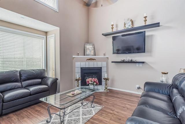 19 Millrose Place Sw, Home with 3 bedrooms, 2 bathrooms and 2 parking in Calgary AB | Image 2