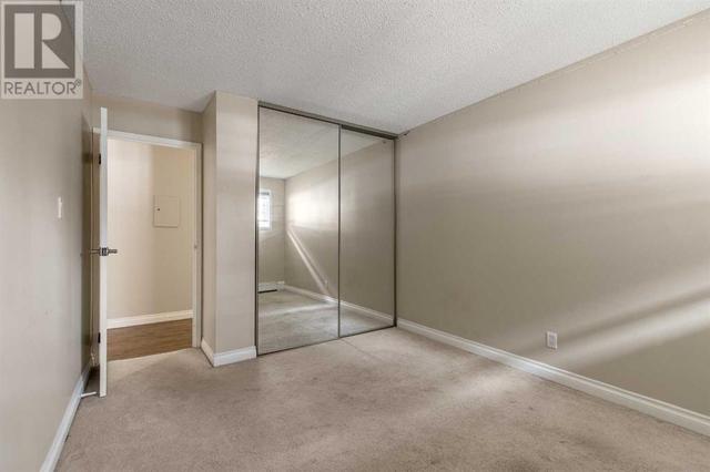 111, - 5 Berkeley Place W, Condo with 2 bedrooms, 1 bathrooms and 1 parking in Lethbridge AB | Image 15