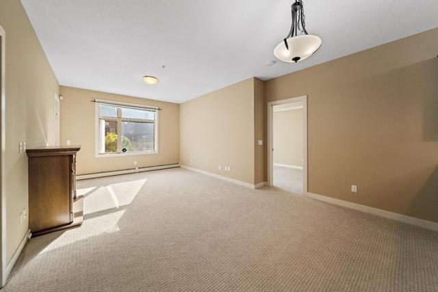 211 - 35 Aspenmont Heights Sw, Condo with 2 bedrooms, 2 bathrooms and 1 parking in Calgary AB | Image 10