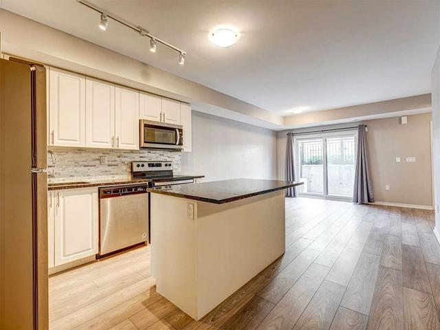 124 - 500 Kingbird Grve, Townhouse with 2 bedrooms, 2 bathrooms and 1 parking in Toronto ON | Image 5