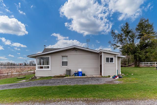 130 West Beach Rd, House detached with 2 bedrooms, 1 bathrooms and 4 parking in Clarington ON | Image 24