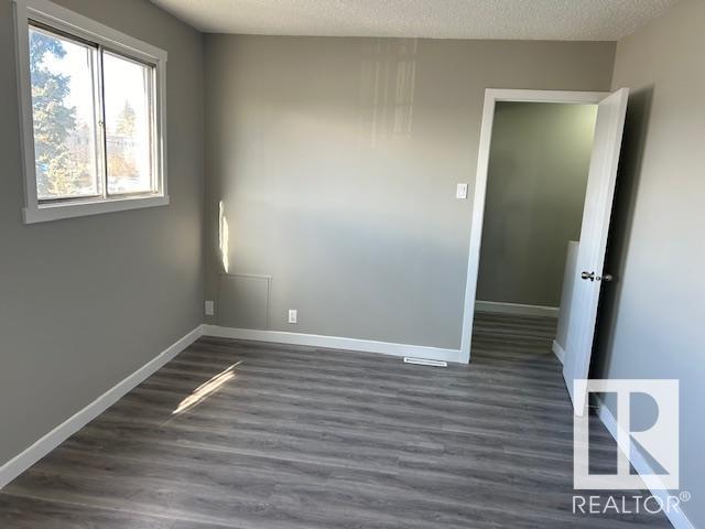 10317 131a Av Nw, House attached with 3 bedrooms, 2 bathrooms and null parking in Edmonton AB | Image 10