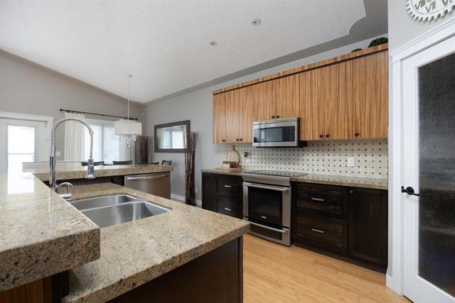 119 Iris Way, House detached with 5 bedrooms, 3 bathrooms and 5 parking in Wood Buffalo AB | Image 5