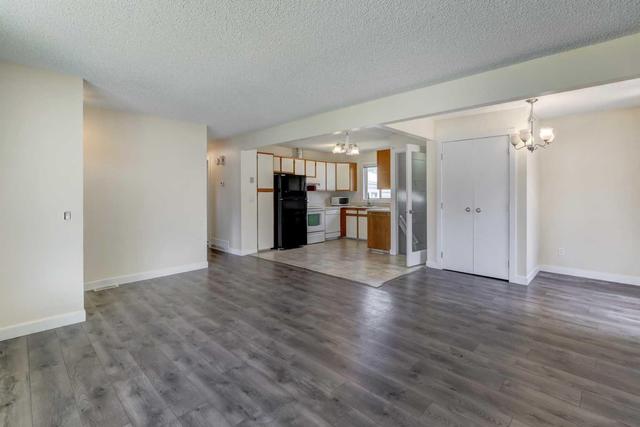 207 Penbrooke Close Se, House detached with 5 bedrooms, 2 bathrooms and 2 parking in Calgary AB | Image 4