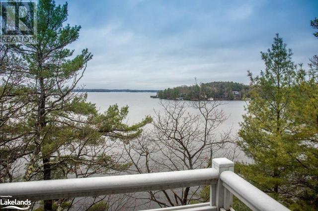 1869 Muskoka 118 Road W Unit# A201  D2, Condo with 2 bedrooms, 2 bathrooms and null parking in Muskoka Lakes ON | Card Image