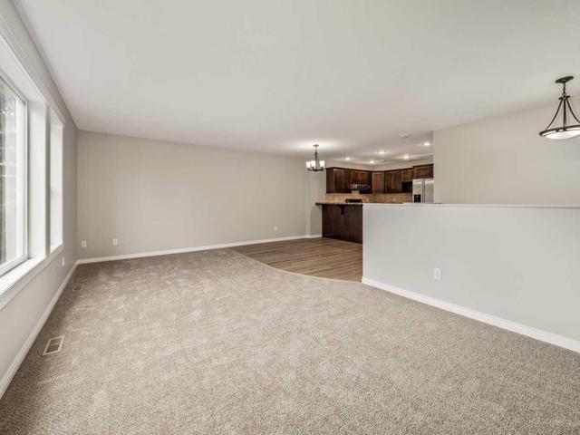 2 - 24 Cougar Cove N, Home with 3 bedrooms, 1 bathrooms and 1 parking in Lethbridge AB | Image 12