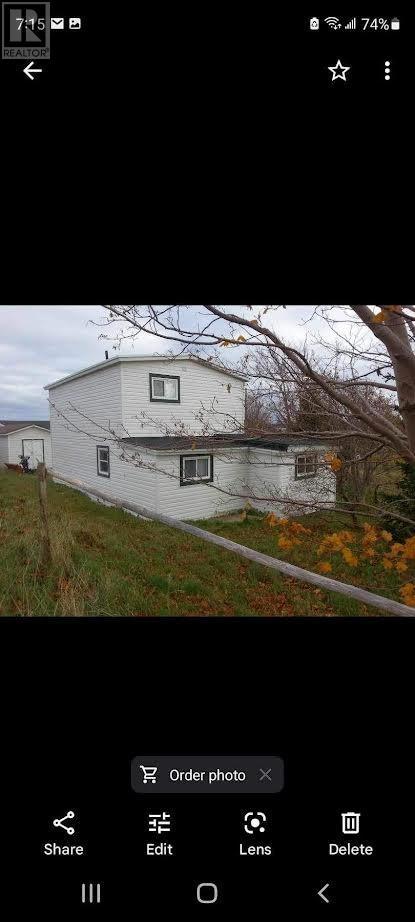 6 Mockin's Place, House detached with 2 bedrooms, 1 bathrooms and null parking in Torbay NL | Card Image