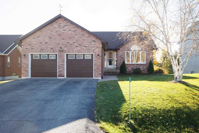 66 Champlain Blvd, House detached with 3 bedrooms, 3 bathrooms and 8 parking in Kawartha Lakes ON | Card Image