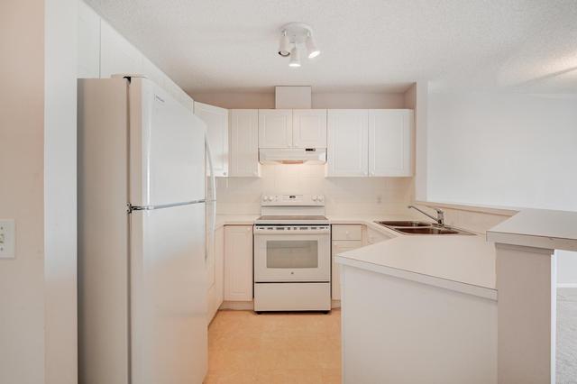 1304 - 950 Arbour Lake Road Nw, Condo with 2 bedrooms, 2 bathrooms and 1 parking in Calgary AB | Image 7